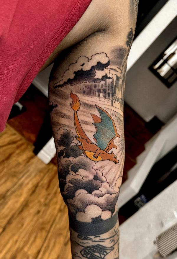 Anime-style Charizard tattoo by Cihan Pohrenk