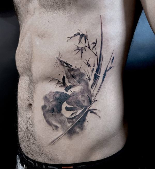 Illustrative ink wash fox tattoo by Cihan Pohrenk in Venice, Los Angeles