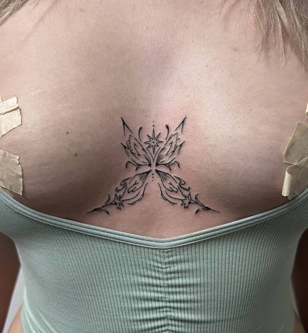 Butterfly and star fine line sternum tattoo by Cihan Pohrenk in Venice, Los Angeles