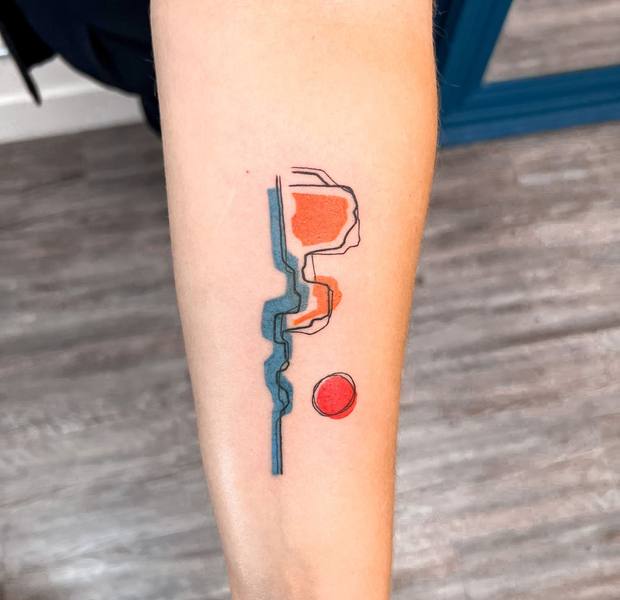 Abstract line art with color fields forearm tattoo by Cihan Pohrenk